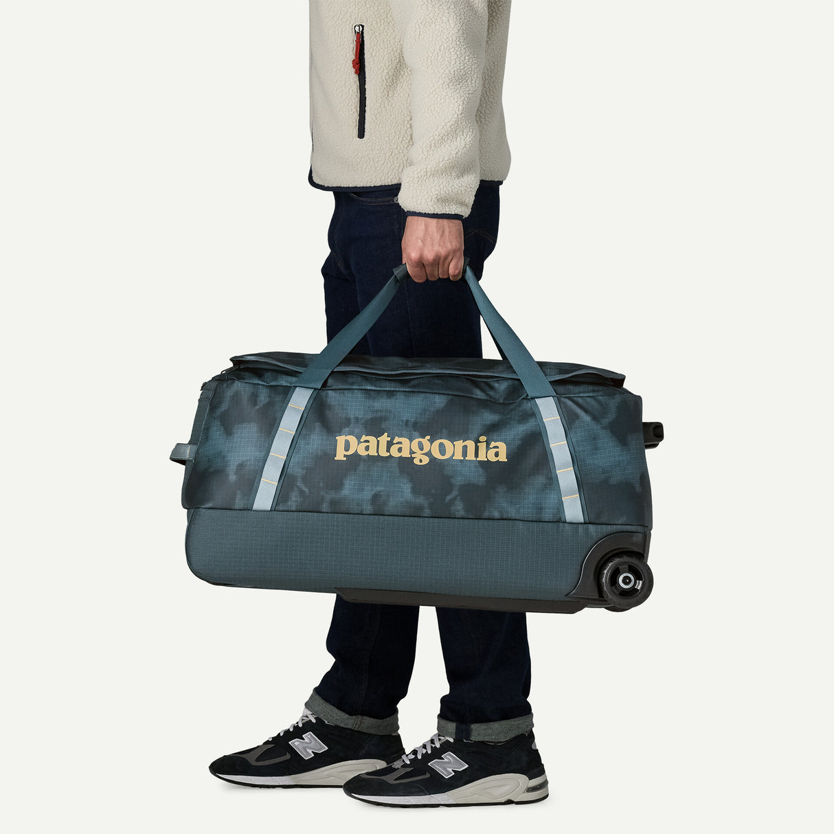 Black Hole Wheeled Duffel 70L